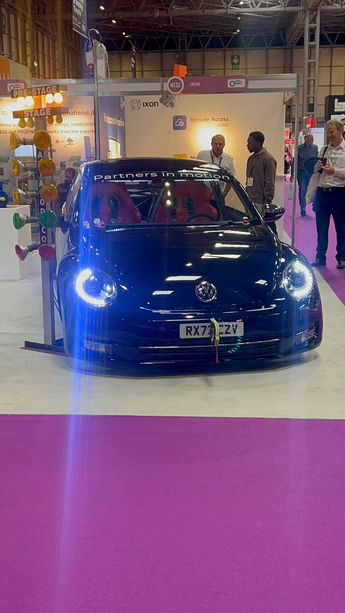 VW Beetle Partners in Motion exhibit at Smart Manufacturing Week Drives Controls expo