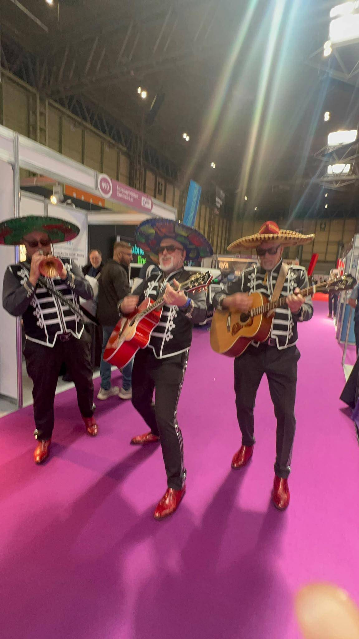 Mariachi band performing in the aisles of Smart Manufacturing Week